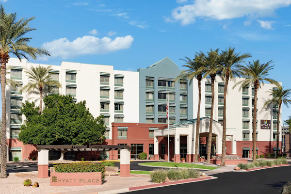 Evening view of Hyatt Place Scottsdale/Old Town illuminated in downtown Scottsdale