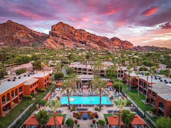 Resort-style swimming pool with private cabanas at Omni Scottsdale Resort & Spa at Montelucia