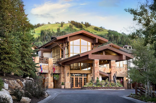 Stein Eriksen Lodge Deer Valley in Park City, Utah, featuring elegant alpine architecture, luxurious accommodations, mountain scenery, and convenient ski-in/ski-out access.