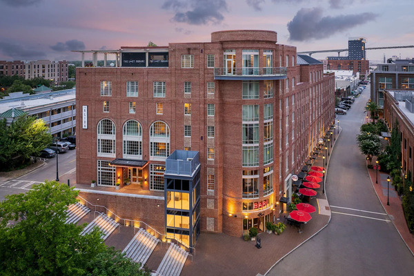 Exterior view of The Alida Hotel Savannah located near the historic River Street district.