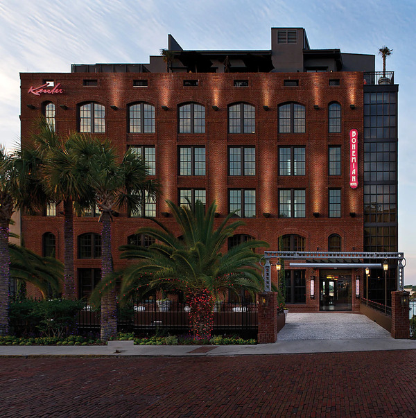 Exterior view of The Bohemian Hotel Savannah Riverfront overlooking the Savannah River in Georgia.