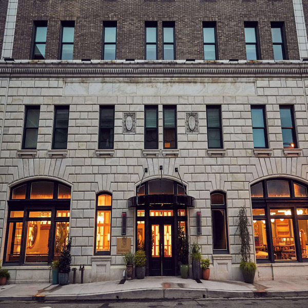 Exterior view of The Drayton Hotel in Savannah, Georgia, featuring elegant boutique architecture.