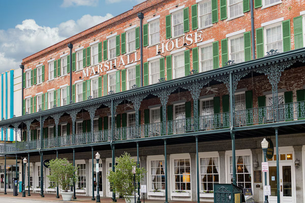 Exterior view of The Marshall House, a historic boutique hotel in Savannah, Georgia.
