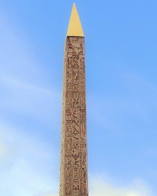 Gold-colored pyramidion at the top of the Luxor Obelisk in Paris