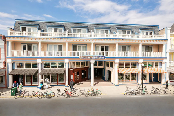 Bicycle Street Inn & Suites on Mackinac Island featuring modern accommodations, spacious suites, downtown location, and convenient access to local shops, restaurants, and attractions.
