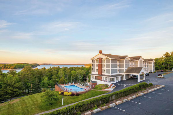 Bluenose Inn in Bar Harbor, Maine, featuring elegant accommodations with scenic views of Frenchman Bay and the surrounding coastal landscape