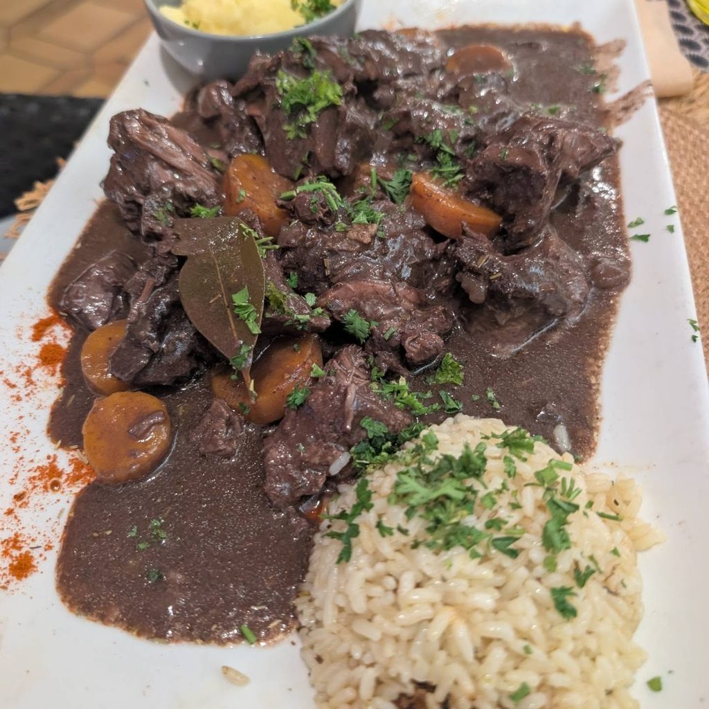 Gardiane de taureau served with Camargue rice in southern France