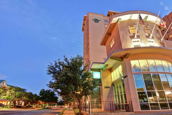 Exterior view of Homewood Suites by Hilton in Houston’s Galleria and Medical Center areas, showcasing modern extended-stay accommodations, spacious suites, and convenient access to shopping, dining, and major healthcare facilities.