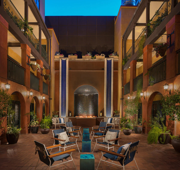Exterior view of Hotel Valencia Riverwalk in San Antonio, featuring elegant Mediterranean-inspired architecture, a stylish boutique design, and a prime location along the San Antonio River Walk.
