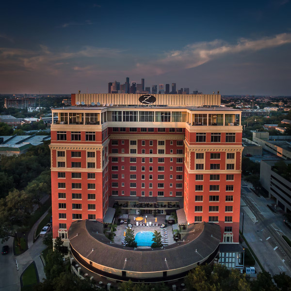 Exterior view of Hotel ZaZa Houston Museum District, a stylish boutique luxury hotel known for its unique design, upscale accommodations, and prime location near Houston's renowned museums.