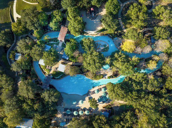 Exterior view of Hyatt Vacation Club at Wild Oak Ranch in San Antonio, featuring rustic-inspired architecture, spacious villa accommodations, landscaped grounds, and a family-friendly resort surrounded by Texas Hill Country scenery.