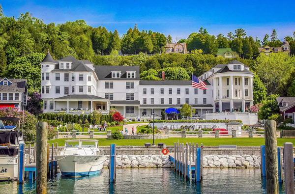 Island House Hotel on Mackinac Island featuring historic Victorian architecture, elegant guest rooms, waterfront views, and a charming atmosphere overlooking Lake Huron.