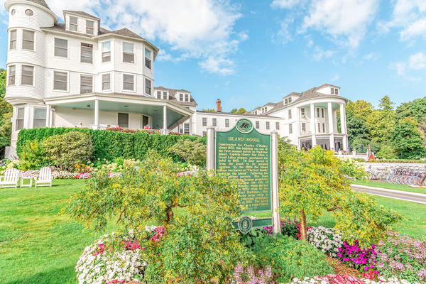 Island House Hotel on Mackinac Island featuring historic Victorian architecture, elegant accommodations, waterfront views, and a charming setting near Lake Huron.