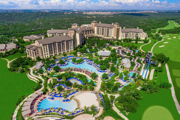 Exterior view of JW Marriott San Antonio Hill Country Resort & Spa, featuring upscale resort architecture, expansive pools, lush Texas Hill Country landscapes, and luxury accommodations.