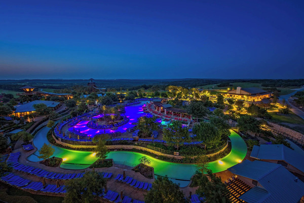 Exterior view of JW Marriott San Antonio Hill Country Resort & Spa, featuring luxurious resort architecture, landscaped grounds, expansive pools, and scenic Texas Hill Country surroundings.