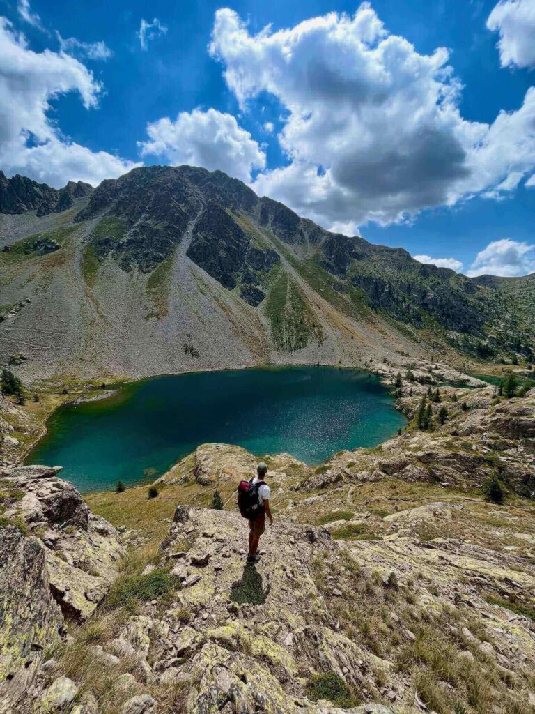 Lac de Trécolpas surrounded by alpine mountains in Mercantour National Park