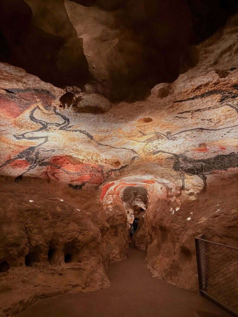Interior of the Lascaux IV replica showing prehistoric cave paintings