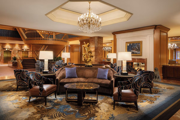 Little America Hotel in Salt Lake City, Utah, featuring spacious guest rooms, classic architecture, lush landscaped grounds, modern amenities, and a convenient downtown location near popular attractions.