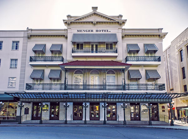 Exterior view of Menger Hotel in San Antonio, showcasing its historic Victorian architecture, elegant facade, and landmark location next to the Alamo in downtown San Antonio.