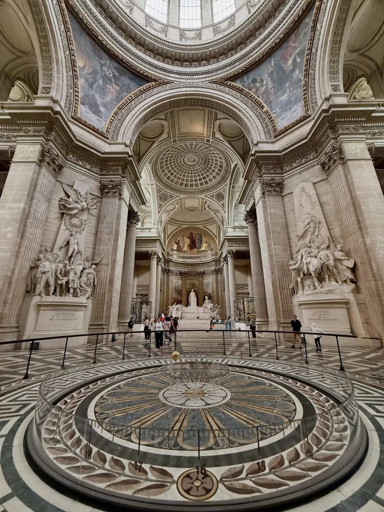 Visitors exploring the interior of the Panthéon in Paris