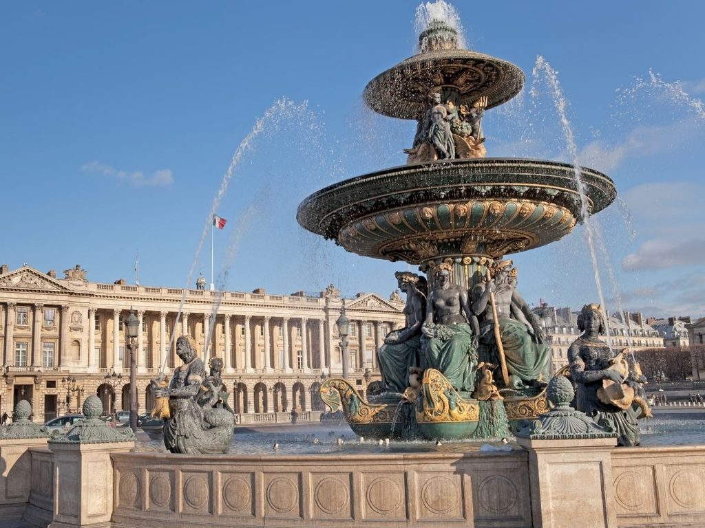 Two fountains framing the Luxor Obelisk at Place de la Concorde