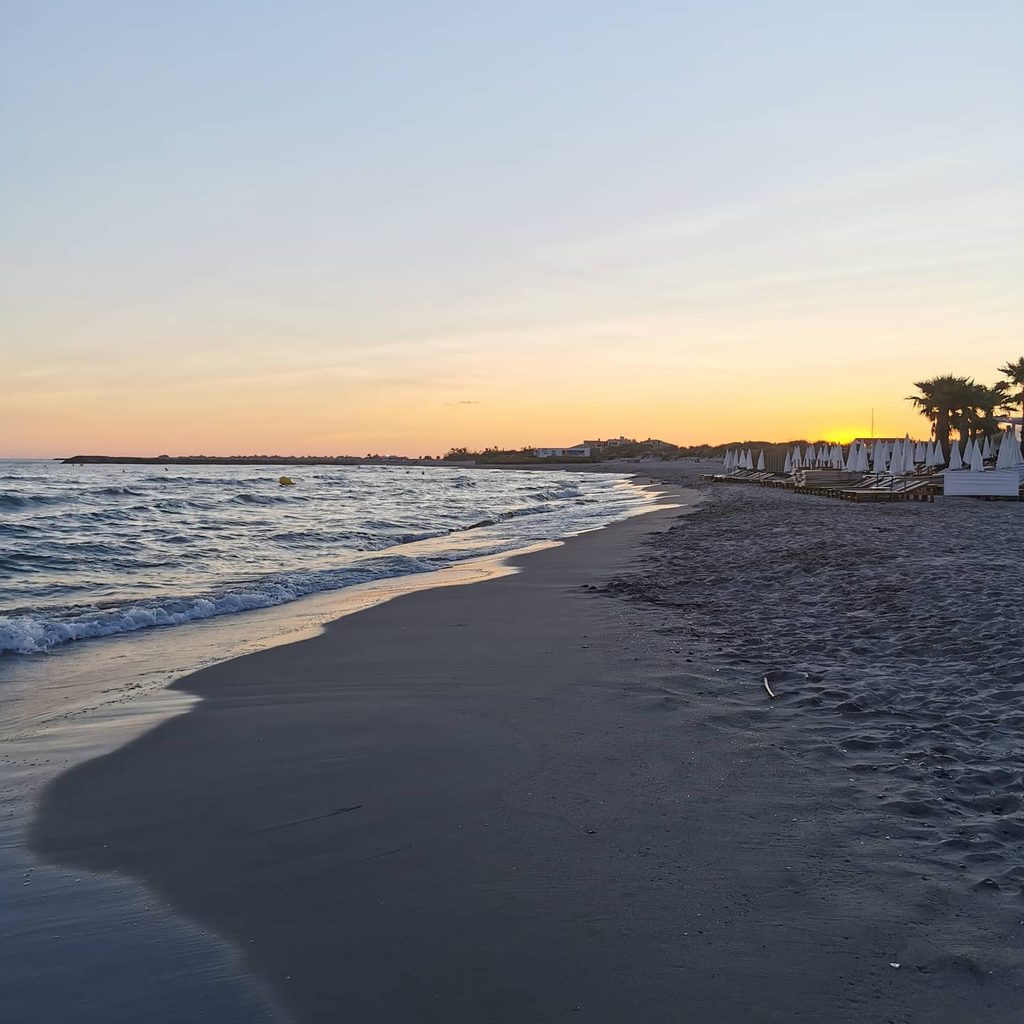 Sandy beach at Saintes-Maries-de-la-Mer during summer