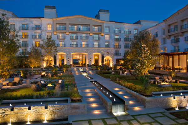 Exterior view of Signia by Hilton La Cantera Resort & Spa in San Antonio, featuring modern luxury architecture, landscaped grounds, resort-style pools, and scenic Texas Hill Country surroundings.