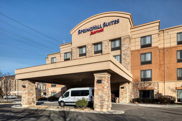 SpringHill Suites by Marriott Salt Lake City Downtown featuring spacious all-suite accommodations, modern amenities, stylish interiors, complimentary breakfast, and a convenient downtown location near top attractions.