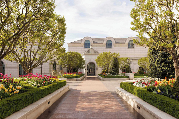 The Grand America Hotel in Salt Lake City, Utah, featuring elegant European-inspired architecture, luxurious guest rooms, premium amenities, fine dining, and beautifully landscaped gardens in a prime downtown location.