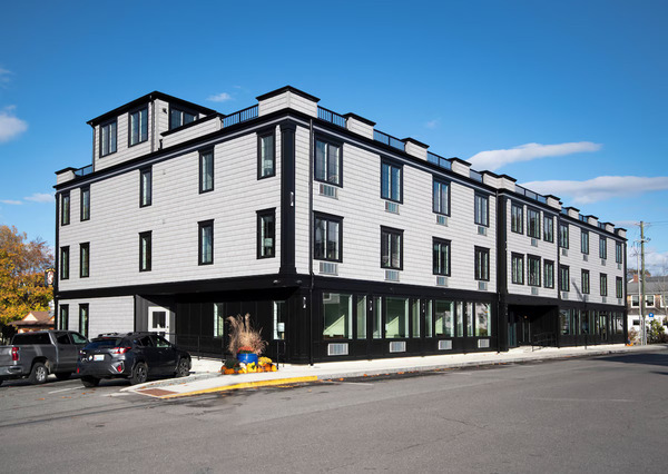 The Pathmaker Hotel in Bar Harbor, Maine, showcasing its stylish exterior and welcoming accommodations for travelers.