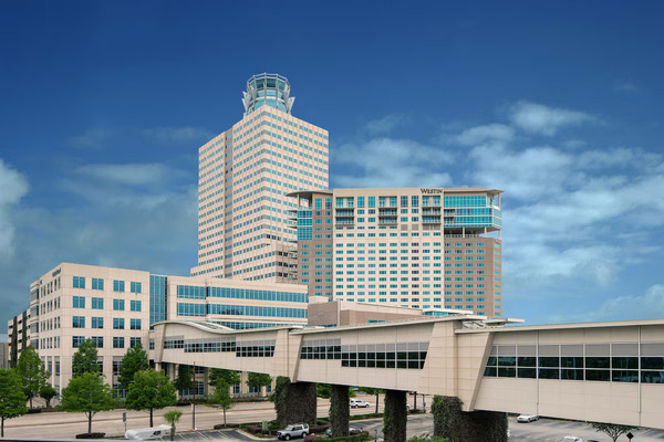 Exterior view of The Westin Houston Memorial City, a modern upscale hotel featuring contemporary architecture, comfortable accommodations, premium amenities, and direct access to Memorial City’s shopping and business district in Houston, Texas.