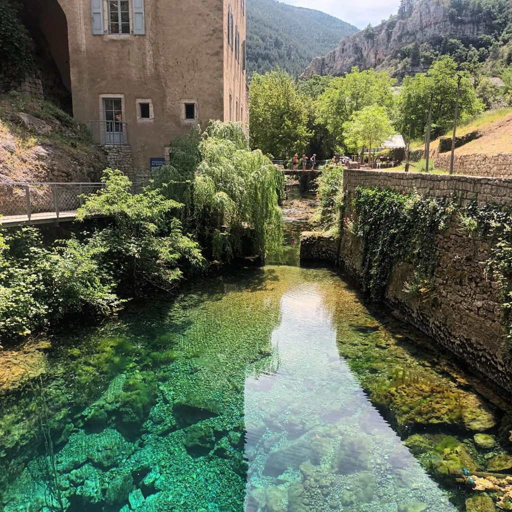 Burle spring with blue water in Sainte-Enimie, France