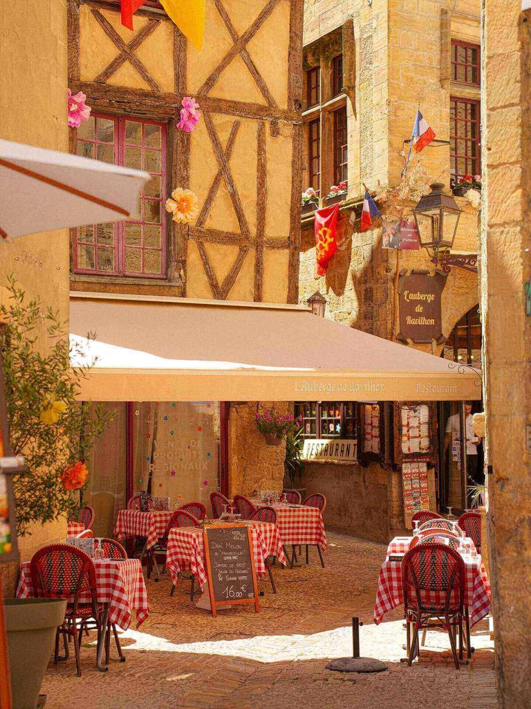 Historic covered market and hotel for lunch in Collonges-la-Rouge