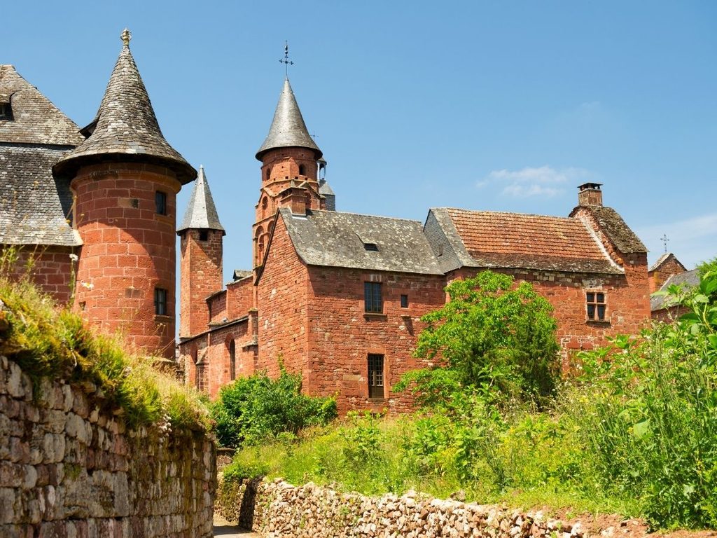 Red sandstone houses in Collonges-la-Rouge during spring