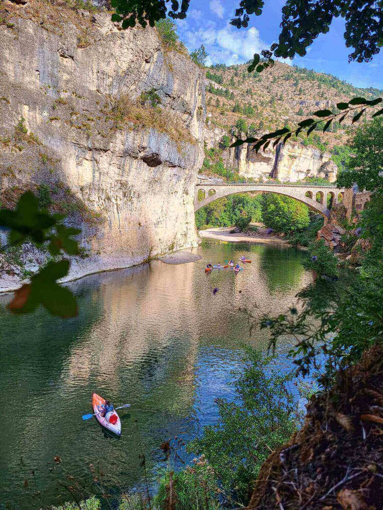 Kayaking between limestone cliffs in the Gorges du Tarn near Sainte-Enimie