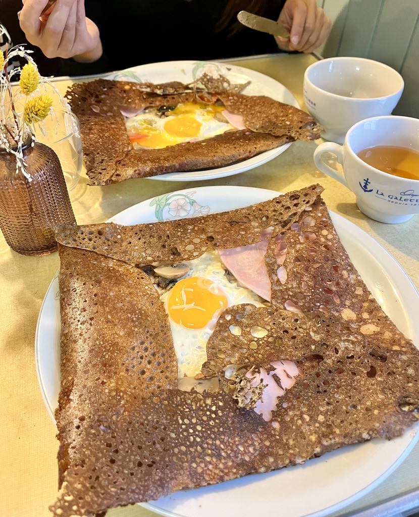 Traditional Breton buckwheat galette with egg, cheese and ham