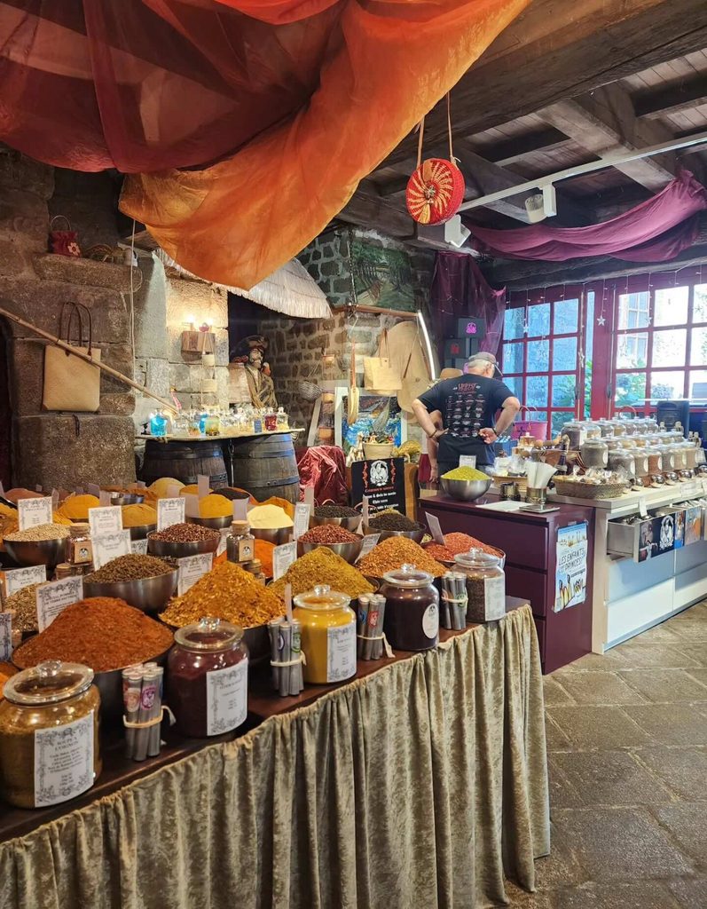 Local market stalls in Locronan selling regional products