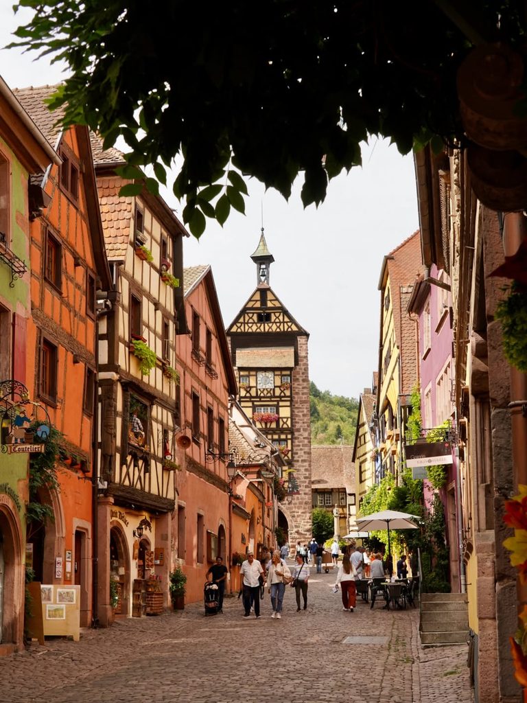 Quiet side street with colourful historic houses in Riquewihr