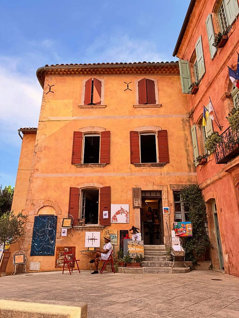 Artwork displayed inside a small gallery in Roussillon, Provence