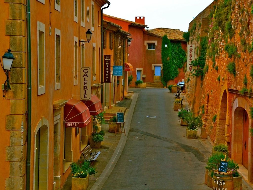 Ochre-coloured houses and narrow streets in the historic centre of Roussillon, Provence