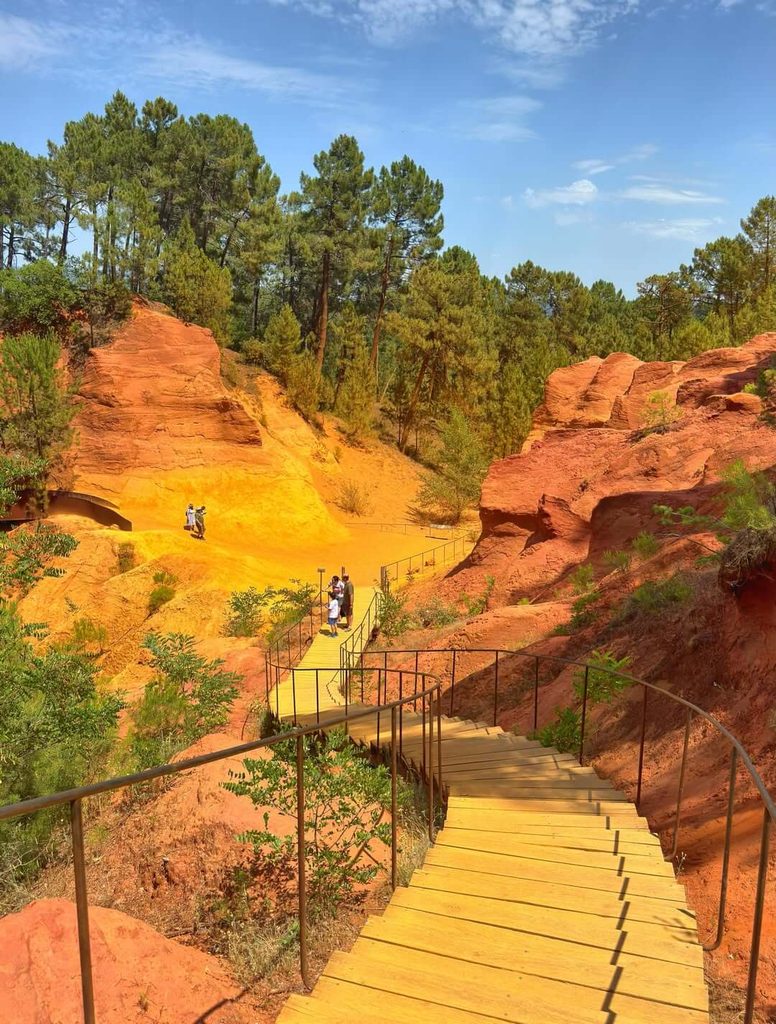 Red and orange ochre cliffs along the Sentier des Ocres in Roussillon