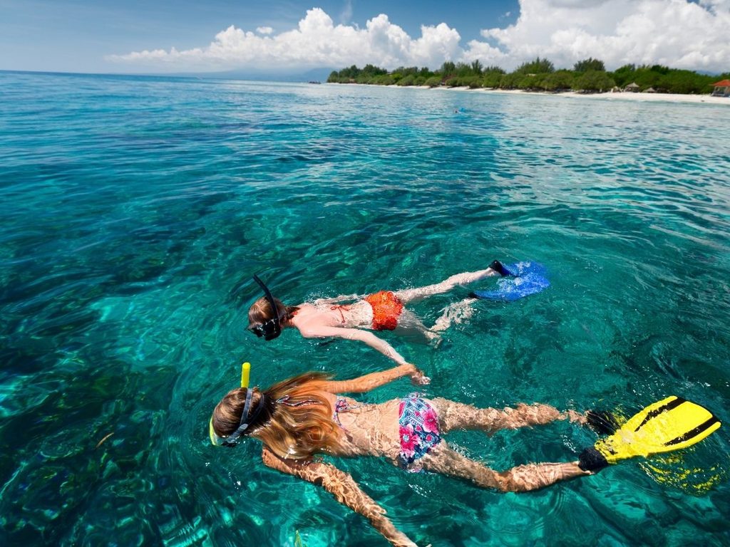 Snorkeler in the clear waters around Tetamanu Pass in Fakarava