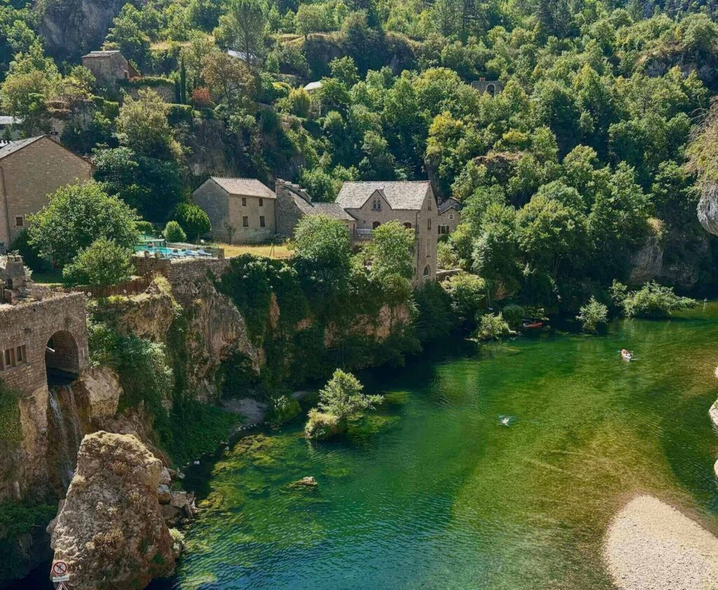Riverside accommodation and the Tarn River near Sainte-Enimie