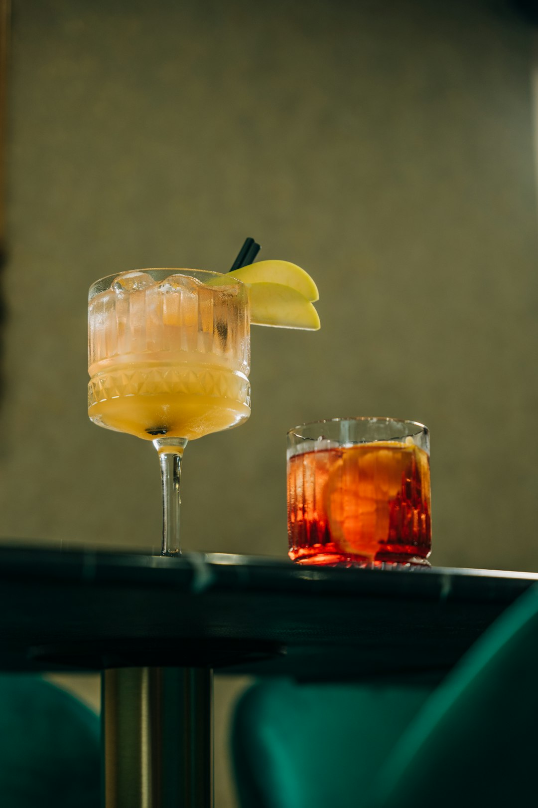 Cocktails being prepared on a bar counter