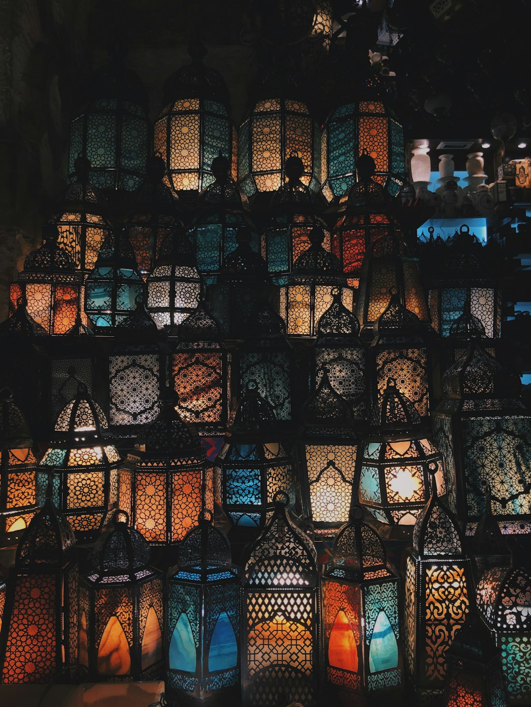 Decorative Ramadan lanterns with Islamic patterns glowing