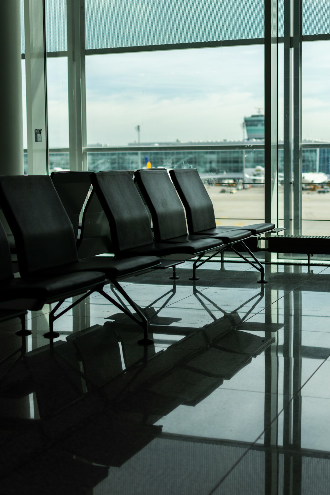 A traveler with a suitcase during an airport layover